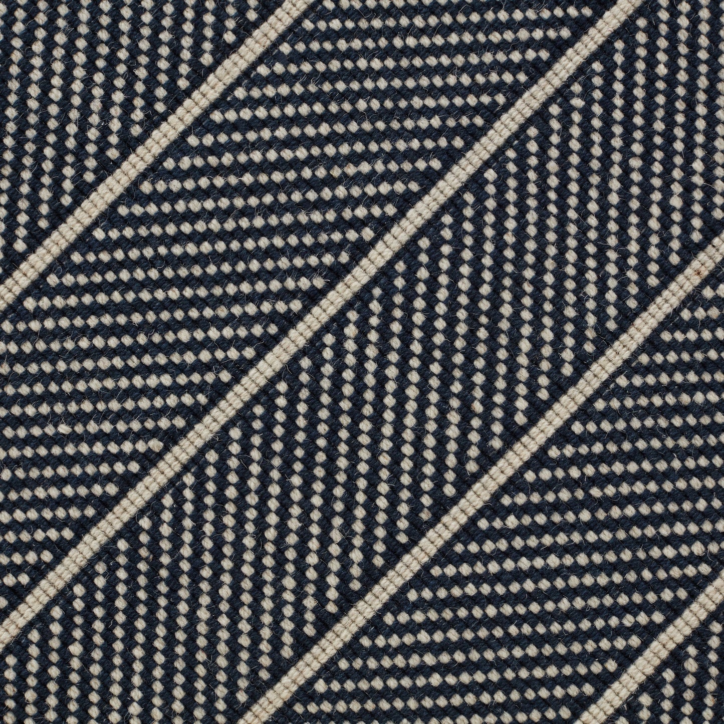 Closeup of Casy Faun Navy Wool Rug
