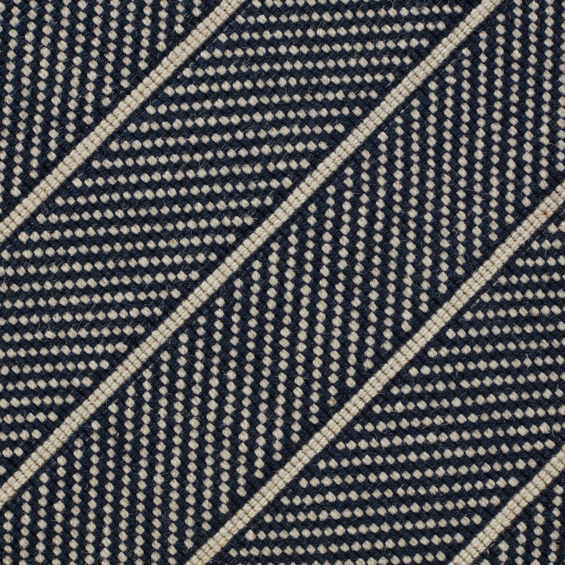 Closeup of Casy Faun Navy Wool Rug